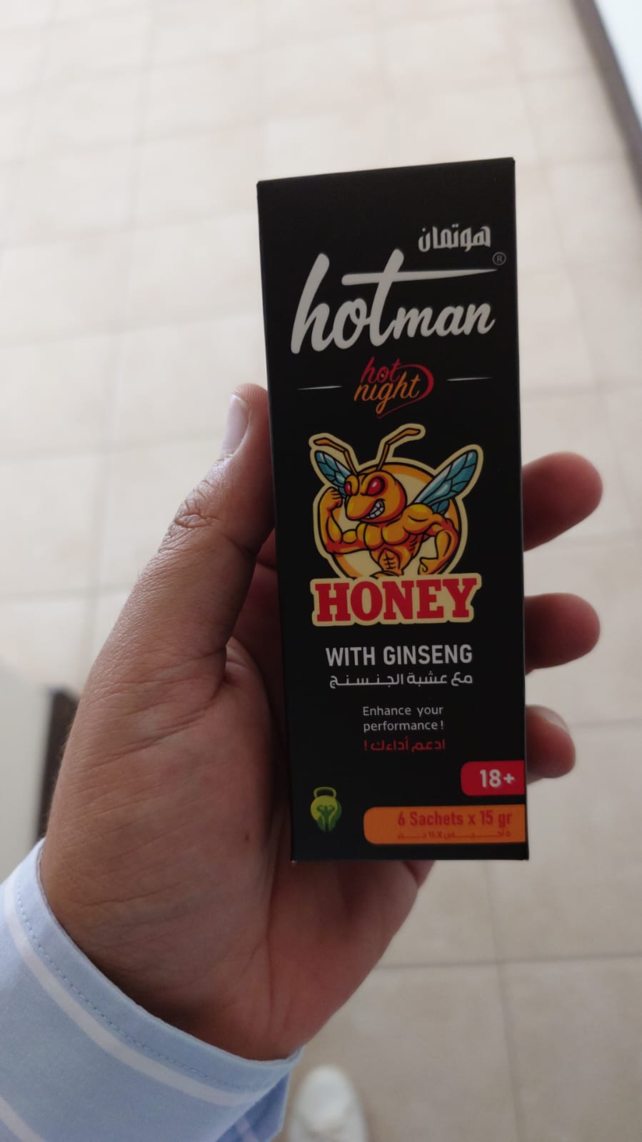 WhatsApp Image 2026-09-23 at 2.08.19 PM HotMan Hot Night Honey with Ginseng box held in hand